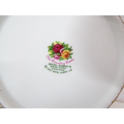 254 - A large quantity of Royal Albert tea and dinner wares in the Old Country Roses pattern, comprising p... 