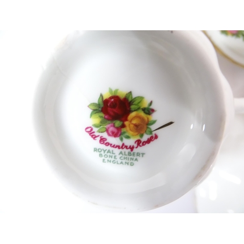 254 - A large quantity of Royal Albert tea and dinner wares in the Old Country Roses pattern, comprising p... 