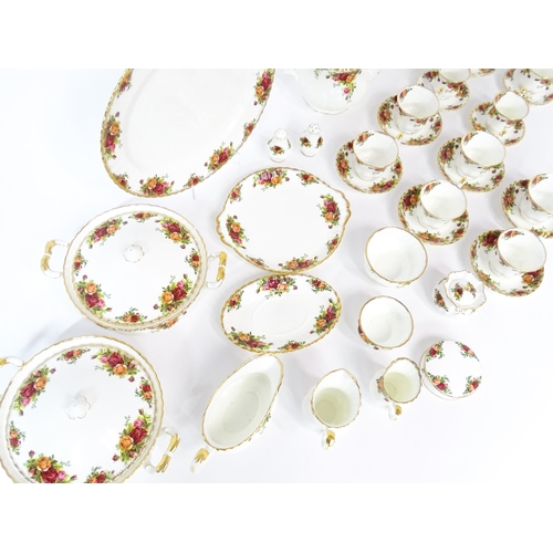 254 - A large quantity of Royal Albert tea and dinner wares in the Old Country Roses pattern, comprising p... 