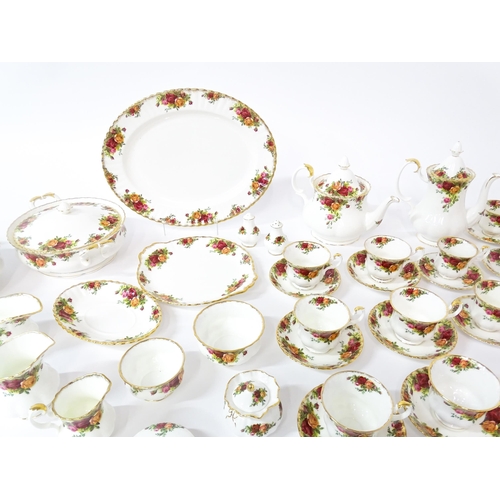 254 - A large quantity of Royal Albert tea and dinner wares in the Old Country Roses pattern, comprising p... 