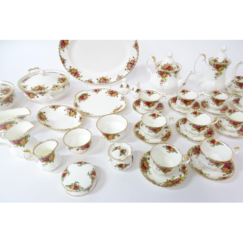 254 - A large quantity of Royal Albert tea and dinner wares in the Old Country Roses pattern, comprising p... 