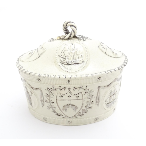 76A - A Leeds Pottery creamware caddy and cover decorated with emblems of the Merchants of the Staple who ... 