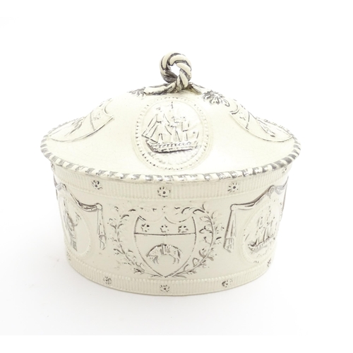 76A - A Leeds Pottery creamware caddy and cover decorated with emblems of the Merchants of the Staple who ... 