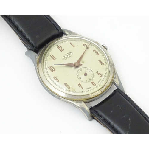 1042 - A gentlemans Weber wristwatch the dial with Arabic numerals and subsidiary seconds dial, and having ... 