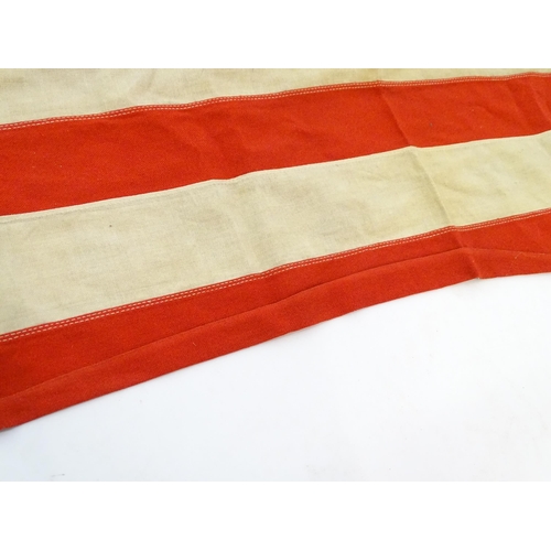 1502 - Militaria : a mid 20thC 'stars and stripes' flag of the United States of America, with 48 stars. Bea... 