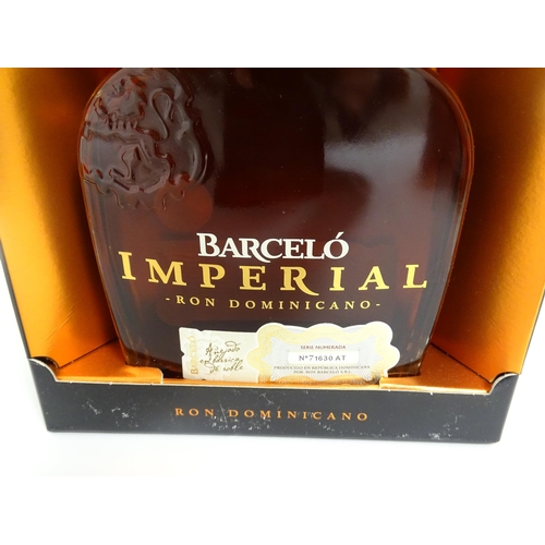 Three boxed 70cl bottles of Barcelo Imperial Ron Dominican rum