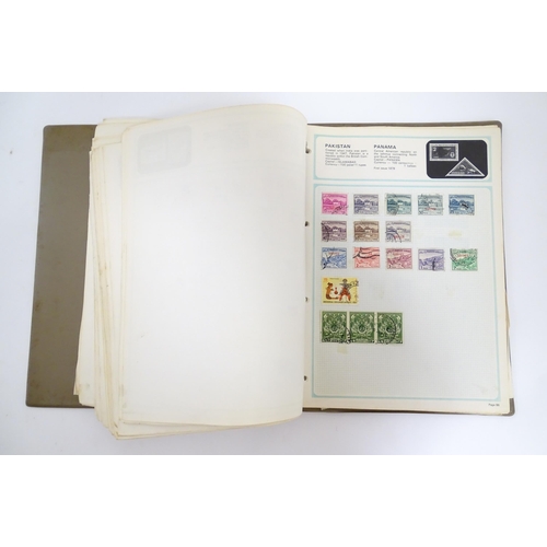 1549 - A stamp album containing Victorian and early to mid 20thC British, colonial and worldwide postage st... 