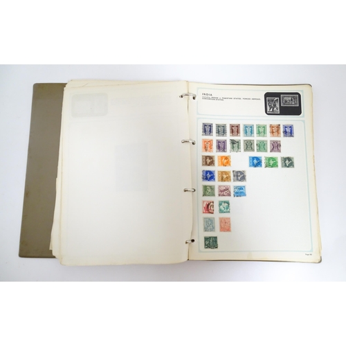 1549 - A stamp album containing Victorian and early to mid 20thC British, colonial and worldwide postage st... 