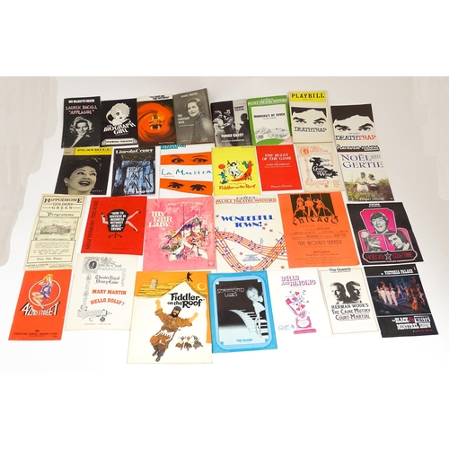 1555 - A quantity of assorted 20thC theatre programmes / souvenirs to include The Sound of Music, How the W... 