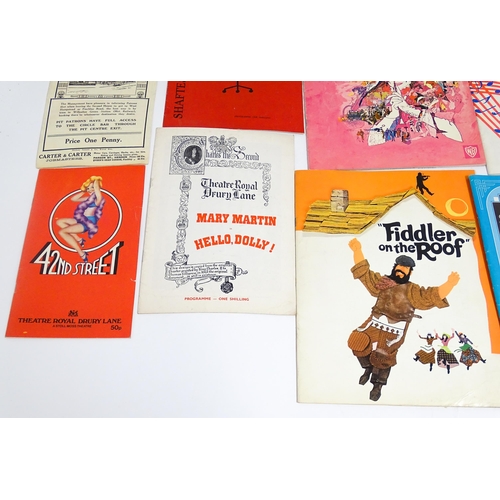 1555 - A quantity of assorted 20thC theatre programmes / souvenirs to include The Sound of Music, How the W... 