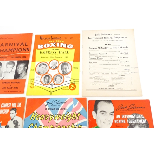 1556 - A quantity of 1950s boxing programmes with tournaments to include Ron Barton vs Yvon Durelle, Arthur... 