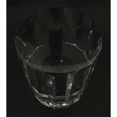 296 - A solid clear glass plinth / stand with 14 facet sides. Approx  5 1/2