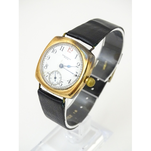 1035 - An American Waltham USA gentlemans 9ct gold cased wristwatch, the white enamel dial with Arabic nume... 