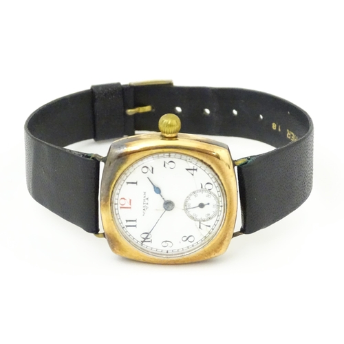 1035 - An American Waltham USA gentlemans 9ct gold cased wristwatch, the white enamel dial with Arabic nume... 