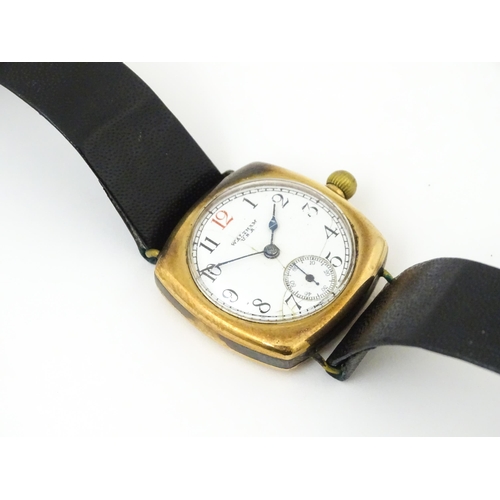 1035 - An American Waltham USA gentlemans 9ct gold cased wristwatch, the white enamel dial with Arabic nume... 