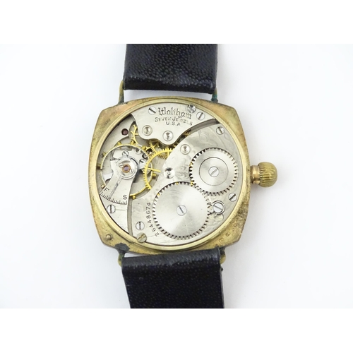 1035 - An American Waltham USA gentlemans 9ct gold cased wristwatch, the white enamel dial with Arabic nume... 