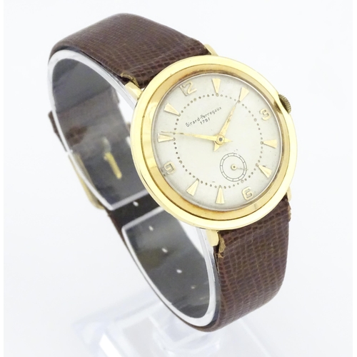 1038 - A vintage Girard Perregaux gentlemans wristwatch with numeral quarters and baton markers, subsidiary... 