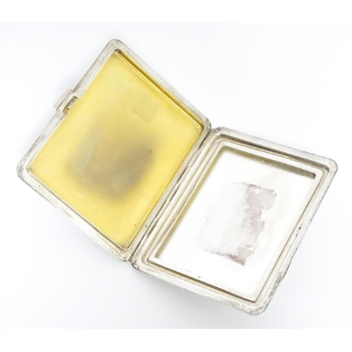 340 - An Art Deco silver compact of rectangular form with engine turned decoration hallmarked Birmingham 1... 