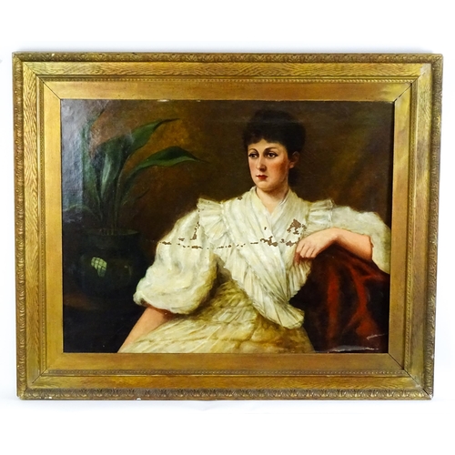 1879 - Late 19th / early 20th century, Oil on canvas, A portrait of a seated young lady with a house plant.... 