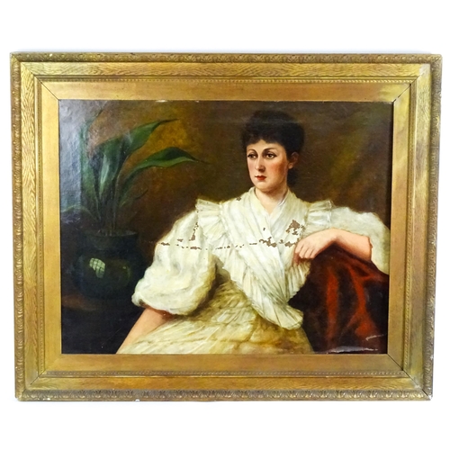 1879 - Late 19th / early 20th century, Oil on canvas, A portrait of a seated young lady with a house plant.... 