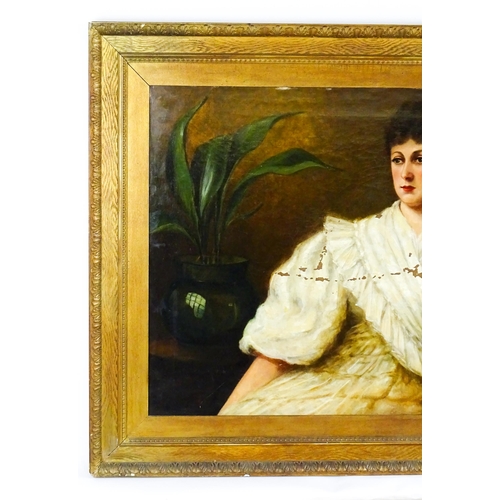 1879 - Late 19th / early 20th century, Oil on canvas, A portrait of a seated young lady with a house plant.... 