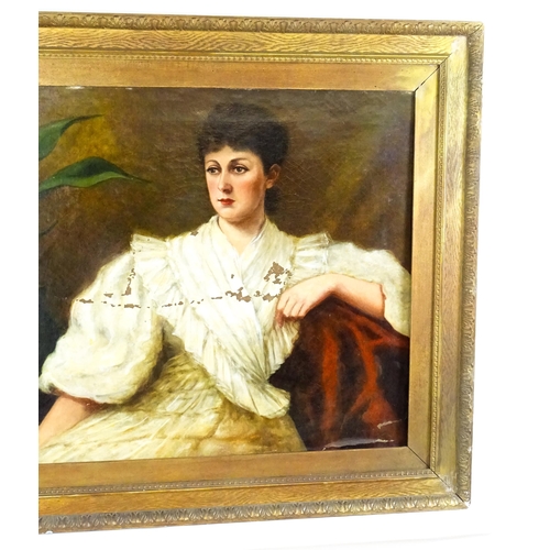 1879 - Late 19th / early 20th century, Oil on canvas, A portrait of a seated young lady with a house plant.... 