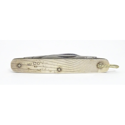 644 - An Art Deco silver folding fruit knife with twin blades hallmarked Sheffield 1939, maker William Nee... 