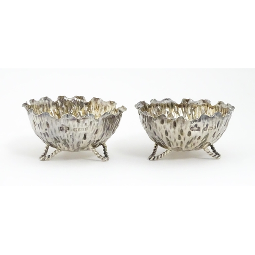 646 - A pair of Arts & Crafts silver salts / small dishes hallmarked Birmingham 1900, maker Sydney Thomas ... 