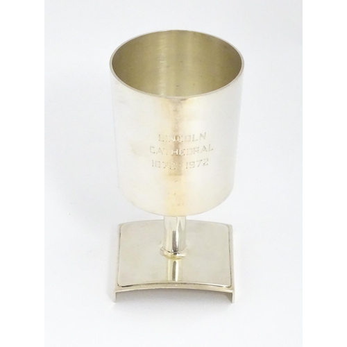 647 - A Elizabeth II silver goblet commemorating the founding of Lincoln Cathedral with enamel detail and ... 