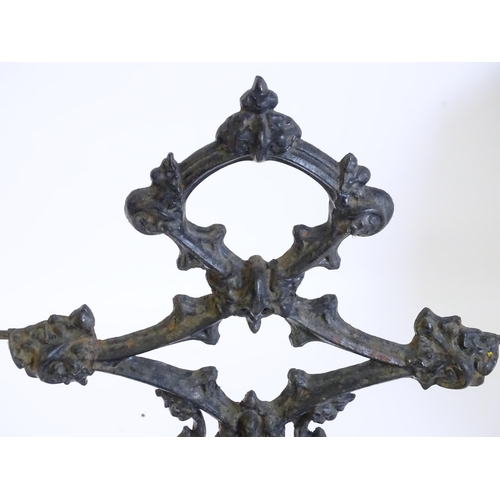 1417 - A late 19th / early 20thC cast iron stick stand with scrolling foliate detail. Impressed No. 100227 ... 