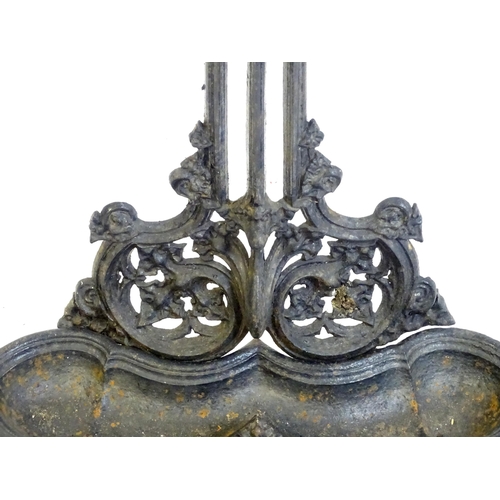 1417 - A late 19th / early 20thC cast iron stick stand with scrolling foliate detail. Impressed No. 100227 ... 