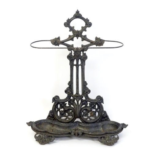 1417 - A late 19th / early 20thC cast iron stick stand with scrolling foliate detail. Impressed No. 100227 ... 