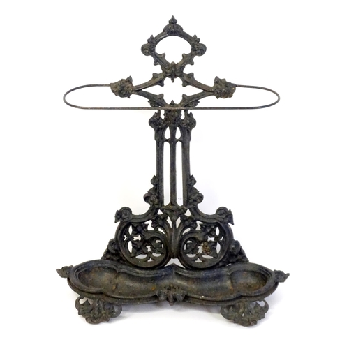 1417 - A late 19th / early 20thC cast iron stick stand with scrolling foliate detail. Impressed No. 100227 ... 