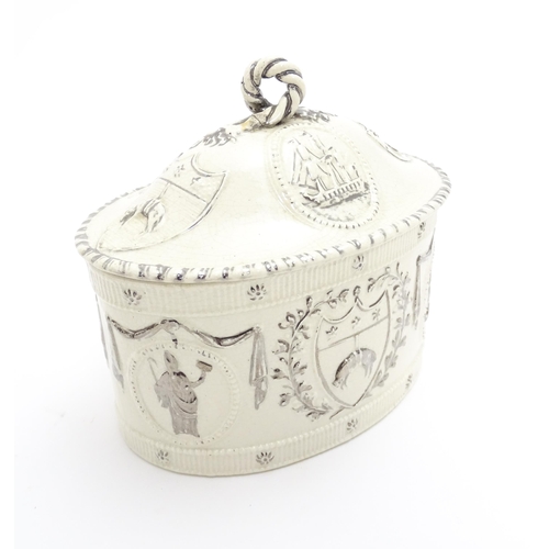 62 - A Leeds Pottery creamware caddy and cover decorated with emblems of the Merchants of the Staple who ... 