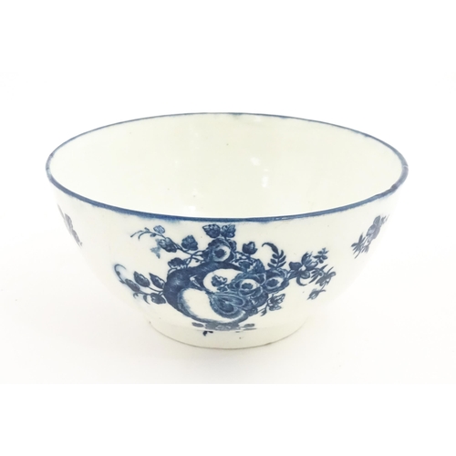 64 - A Caughley blue and white bowl decorated in the Slice Apple and Damson pattern. Marked with S under.... 