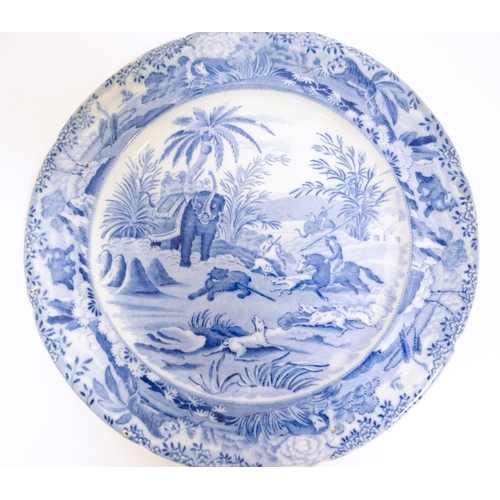 106 - An Edward Challinor blue and white plate in the Death of the Bear pattern from the Oriental Sports s... 