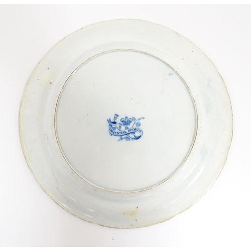 106 - An Edward Challinor blue and white plate in the Death of the Bear pattern from the Oriental Sports s... 