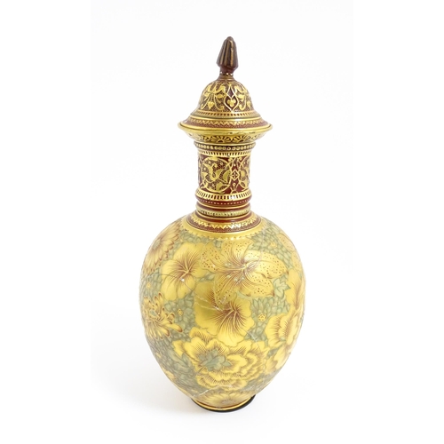 117 - A Victorian Royal Crown Derby bottle vase and cover with gilt floral decoration. Marked under with r... 