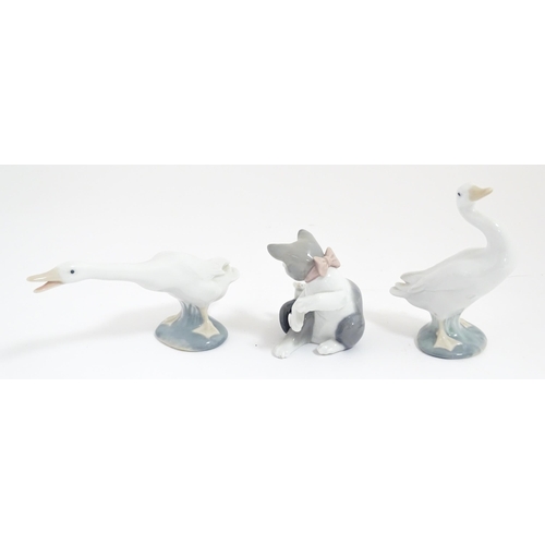 178 - Three Lladro animals comprising Cat with Mouse, Honking Goose and Duck. With boxes. Goose approx. 6