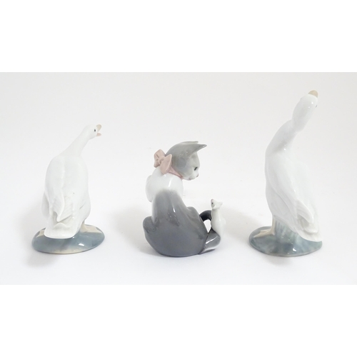 178 - Three Lladro animals comprising Cat with Mouse, Honking Goose and Duck. With boxes. Goose approx. 6