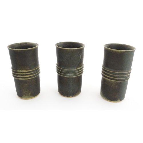 184 - Five studio pottery items by Deborah Hopson Wolpe, comprising ewer, bowl, and three beakers each wit... 