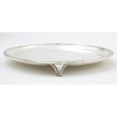 448 - A silver salver / card tray hallmarked London 1946, maker Edward Barnard & Sons Ltd. Approx. 8