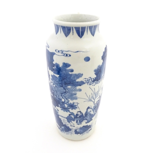 1 - A Chinese blue and white vase decorated with a procession of figures in a landscape. Approx. 15 1/4