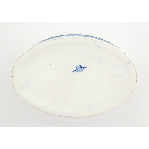 115 - A Mintons blue and white chestnut bowl with banded floral decoration and pierced rim. Marked under. ... 