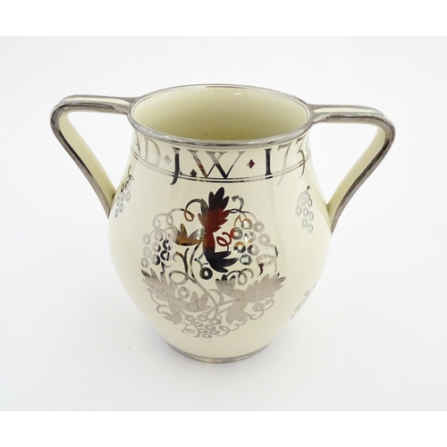 116 - A Wedgwood twin handled bicentenary vase designed by Louis Powell commemorating the birth of Josiah ... 