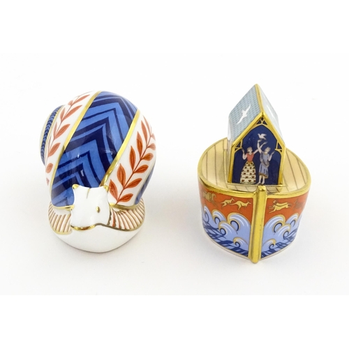 120 - Two Royal Crown Derby paperweights, one modelled as a snail, the other as Noah's Ark. Marked under. ... 