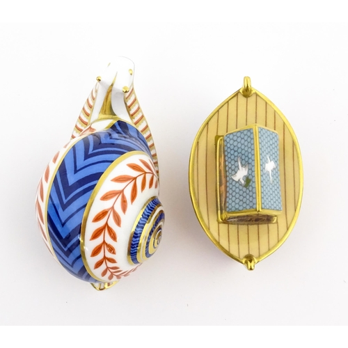 120 - Two Royal Crown Derby paperweights, one modelled as a snail, the other as Noah's Ark. Marked under. ... 