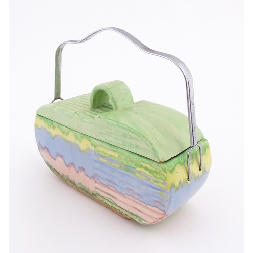 120A - An Art Deco Beswick biscuit barrel with stylised landscape detail. Shape no. 170, marked under. Appr... 