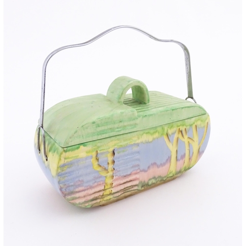 120A - An Art Deco Beswick biscuit barrel with stylised landscape detail. Shape no. 170, marked under. Appr... 