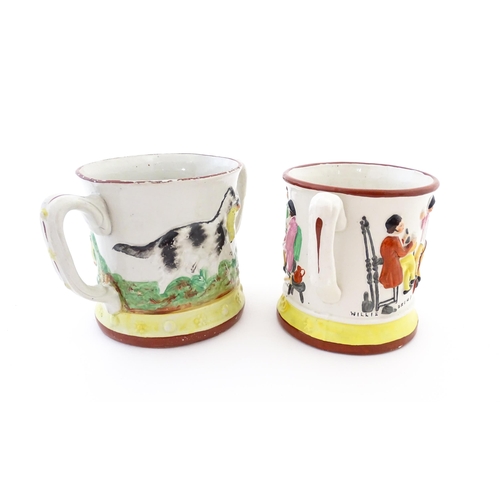 59A - Two Staffordshire pottery loving cups / frog mugs, one with relief decoration depicting a hunting do... 